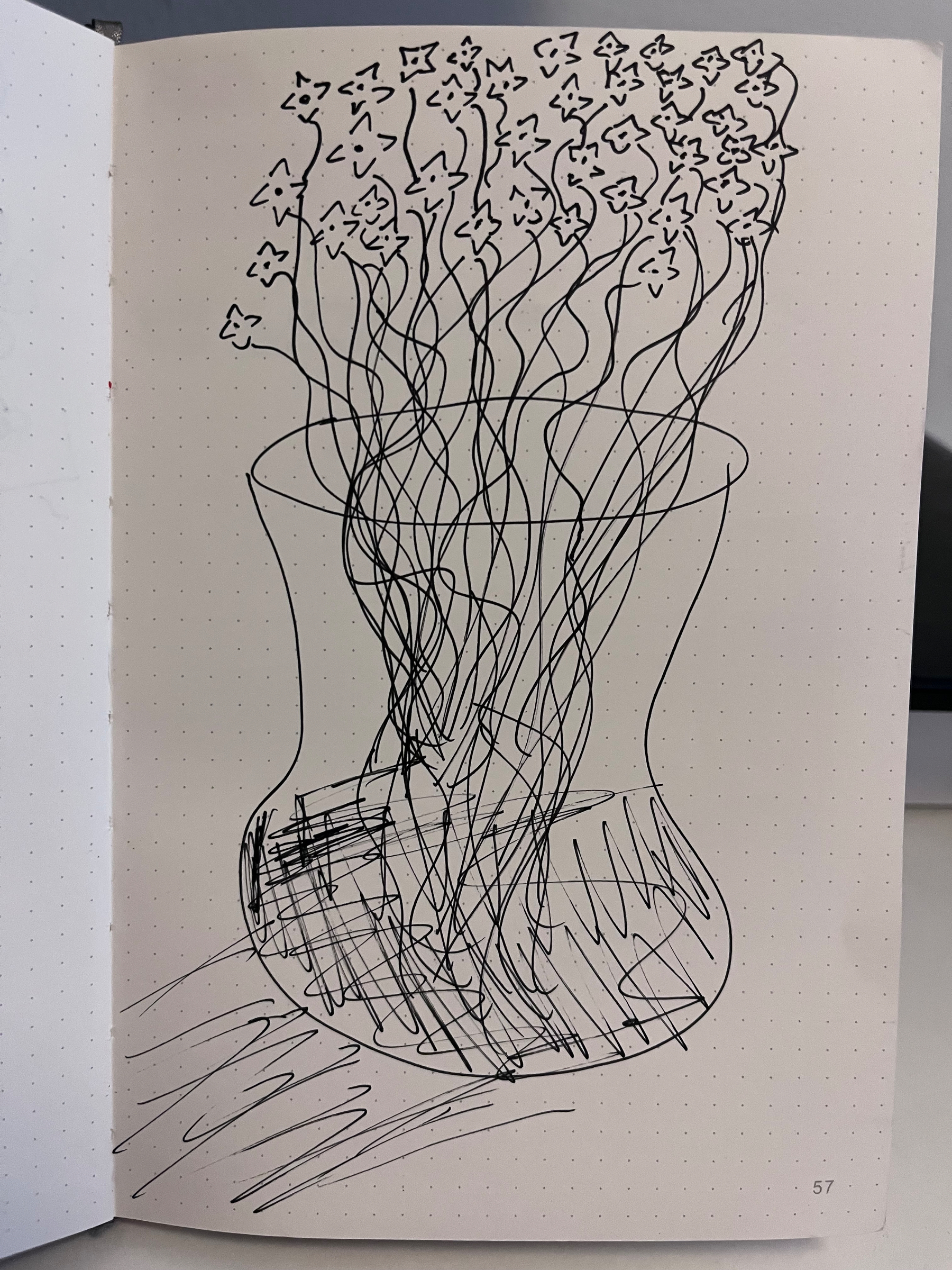 A transparent vase holds a cluster of flowers with long, wavy stems, all sketched with black ink on dotted paper.